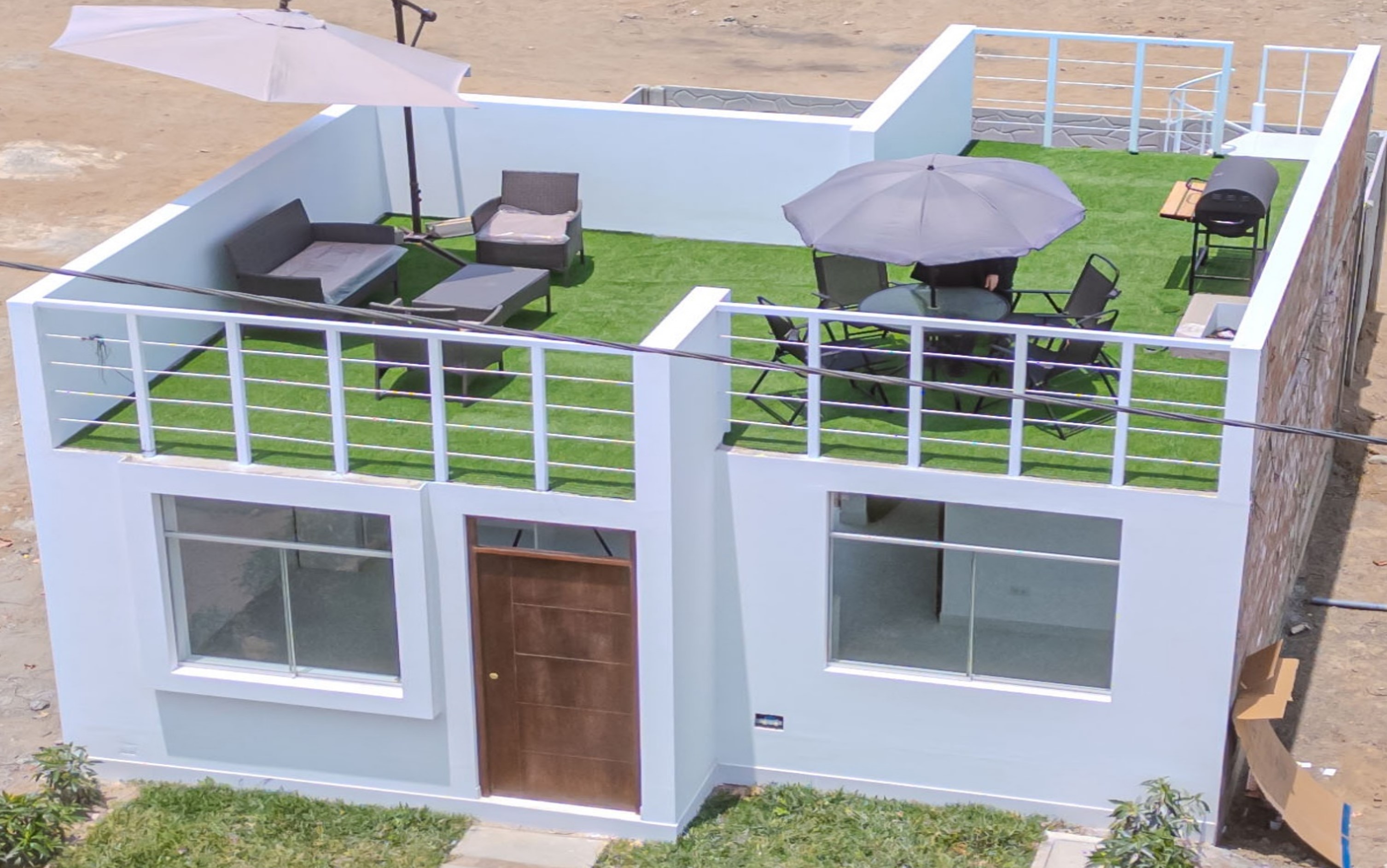 Fachada real de la casa en La Planicie de San Benito